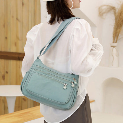 💞60K+ SOLD!🎒 Lightweight Crossbody Bag – Multi-Pocket Nylon Shoulder Purse, Water-Resistant, Adjustable Strap – Perfect for Travel, Daily Commute (Black, Dark Blue, Blue-Green, Dark Purple)